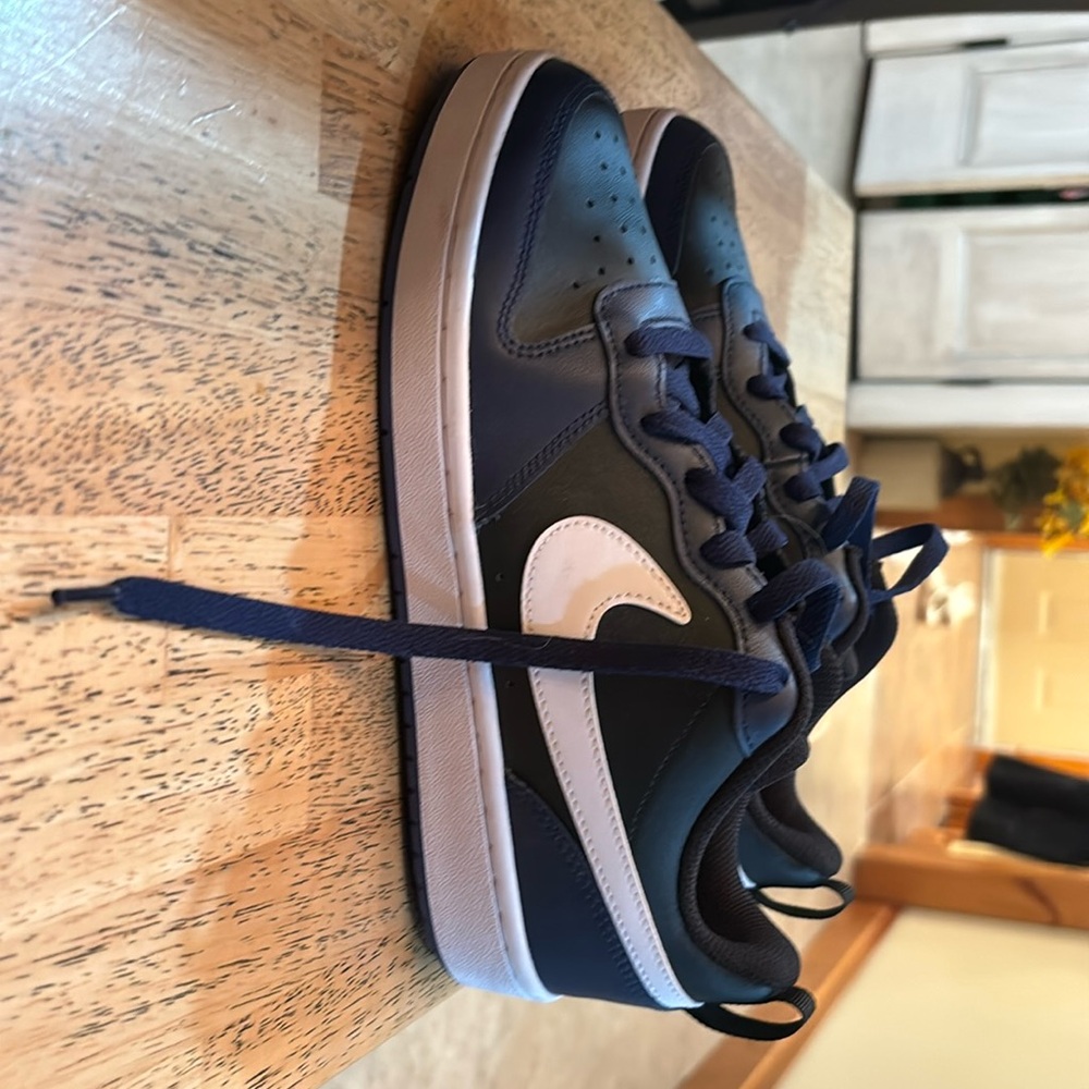 Never worn boys Nike black and blue